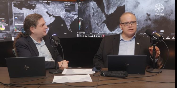 FAO Chief Economist Maximo Torero, right, and David Laborde, head of FAO’s Agrifood Economics Division, discuss the Strait of Hormuz crisis in FAO’s Situation Room.